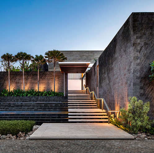 SAOTA perches a stunning resort-inspired house atop a rocky cliff in Bali