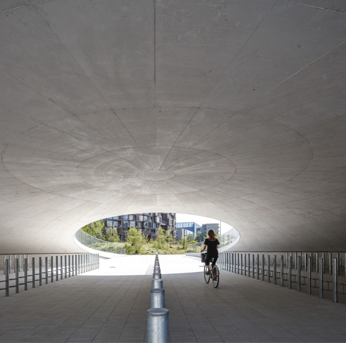 COBE creates a landscape of hollow hills for a bicycle parking space in Copenhagen 