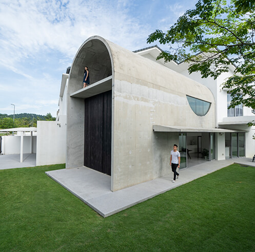Fabian Tan fits a chunky barrel-vaulted annex to a suburban home in Kuala Lumpur