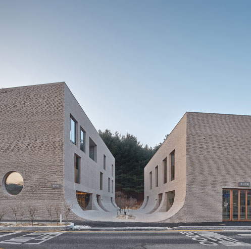 NAMELESS Architecture&rsquo;s Caf&eacute; Teri in South Korea is a concrete edifice with flowing walls