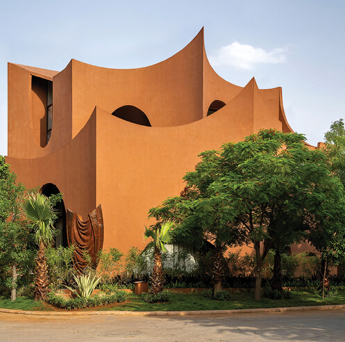 Sanjay Puri Architects replicates arched walls in this inward-looking house in India