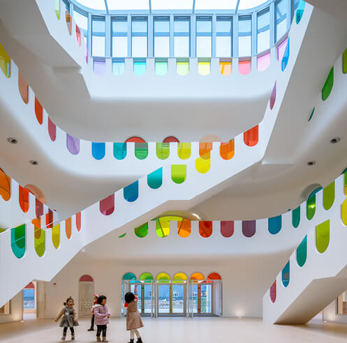 SAKO Architects adorns Kaleidoscope kindergarten in China with colourful glass