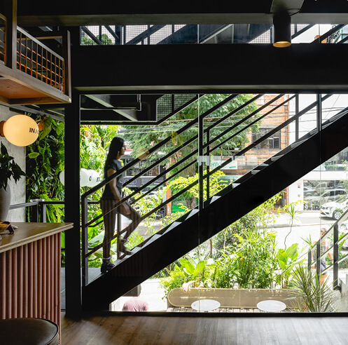 A5 Arquitectura inserts an industrial staircase outside The Somos in Medell&iacute;n