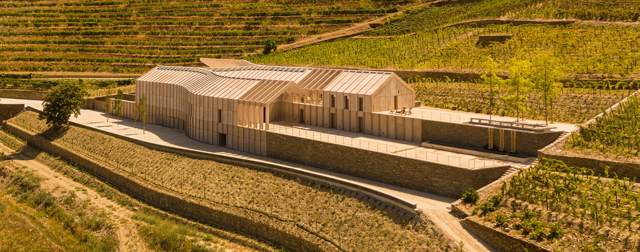 Quinta de Adorigo’s sinuous timber profile mirrors Portugal’s oldest vineyards Quinta de Adorigo’s sinuous timber profile mirrors Portugal’s oldest vineyards