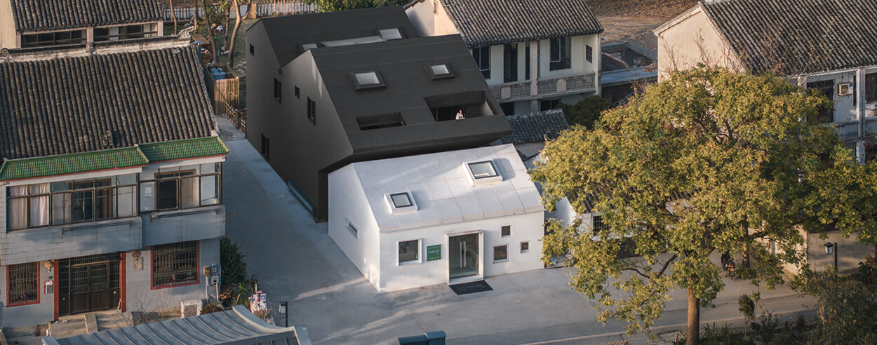 Wutopia Lab's Heart Fields in China stages a monochrome pairing denying rural clichés Wutopia Lab's Heart Fields in China stages a monochrome pairing denying rural clichés