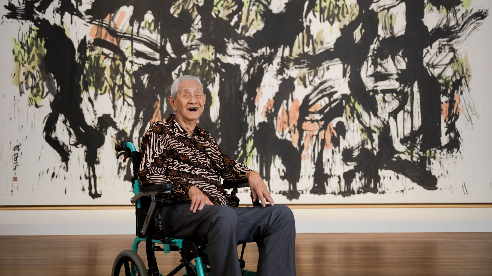 Artist Lim Tze Peng at ‘Becoming Lim Tze Peng’, National Gallery Singapore, 2024 |Becoming Lim Tze Peng | STIRworld