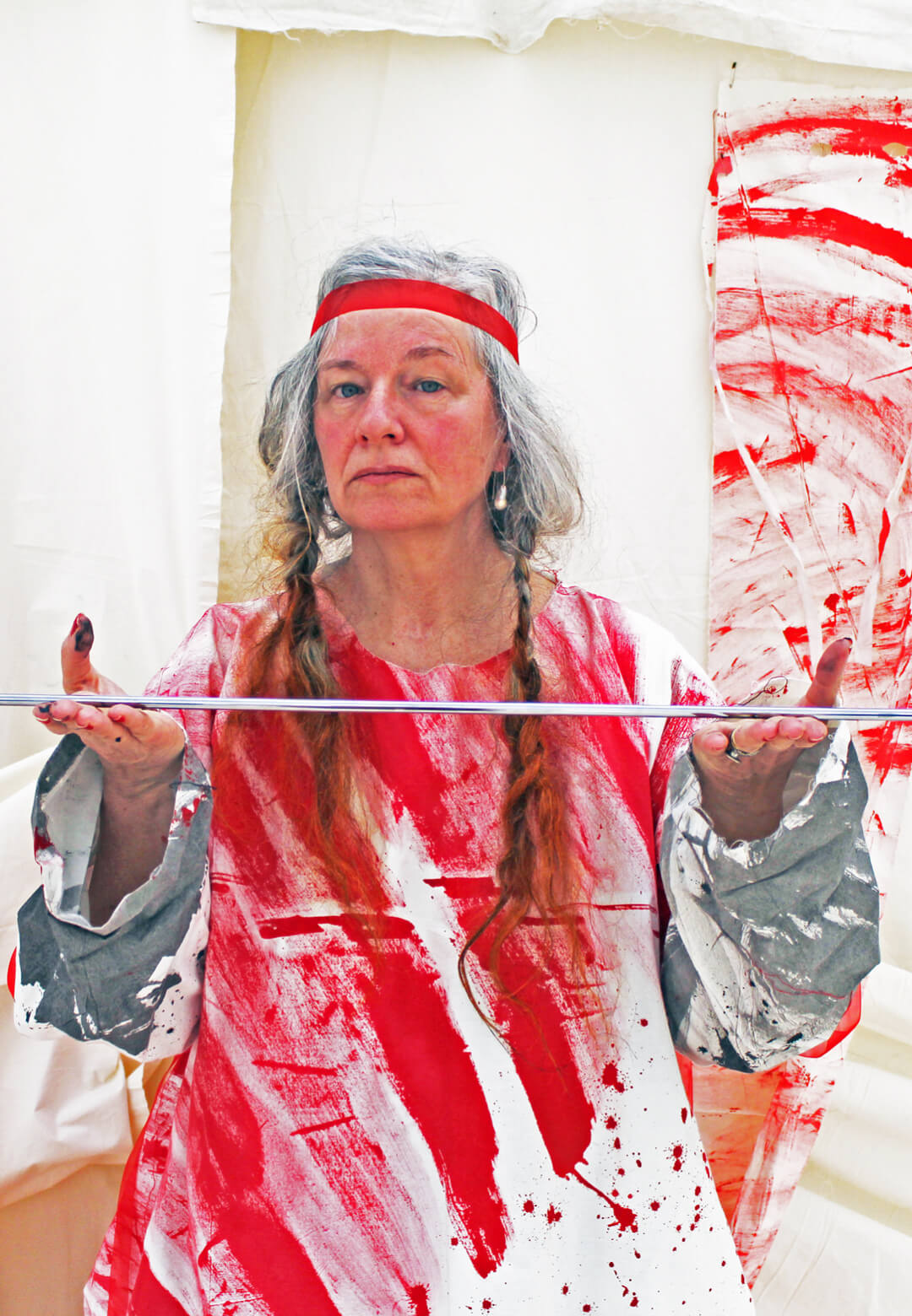 Delaine Le Bas pictured at ‘Fabricating My Own Myth – Red Threads & Silver Needles’, Newcastle Contemporary Art, 2025 | Newcastle Contemporary Art |Delaine Le Bas | STIRworld