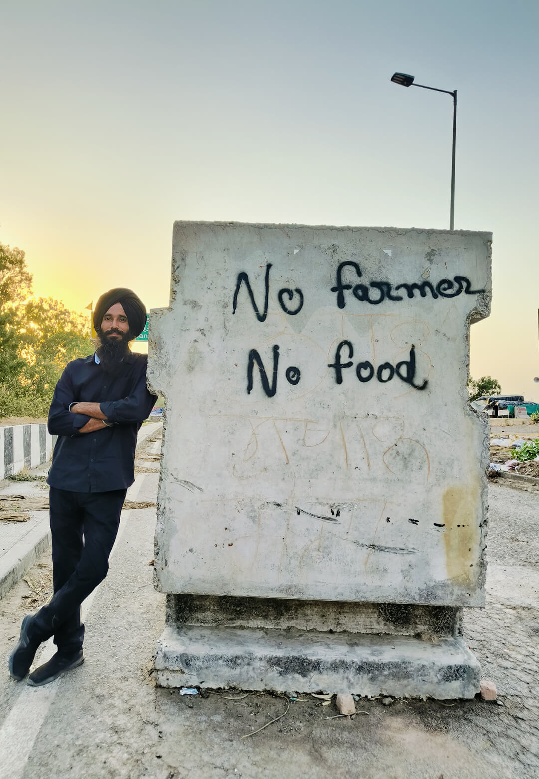 Installation view of &lsquo;Indelible Black Marks&rsquo;, 2022 &ndash; 24, Kulpreet Singh, Kochi-Muziris Biennale; Kulpreet Singh at Shambhu Border, during India&rsquo;s Farmers&rsquo; Protest | Indelible Black Marks | Hayward Gal