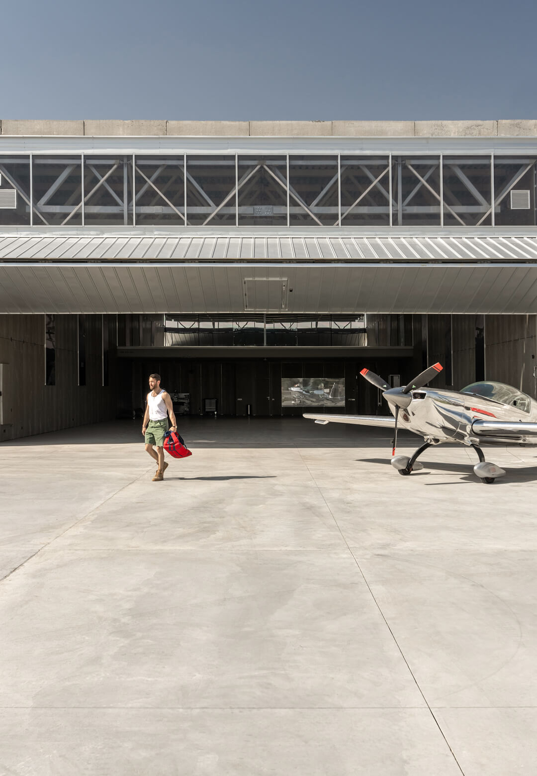 Designed by +kouple, AEROTIM Hangar in Ukraine centres operability with a restrained design language to achieve an industrial character | AEROTIM Hangar | +kouple | STIR