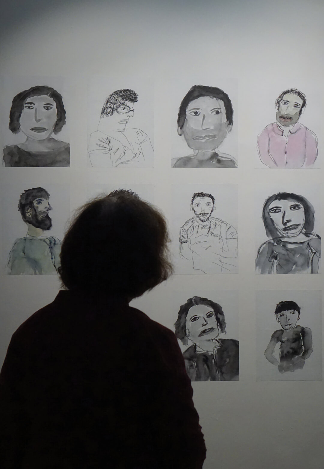Installation view of Faces, illustrations with pen ink and watercolour, All Together Now, India International Centre, 2024, Srinivas Kuruganti |All Together Now | IIC | STIRworld