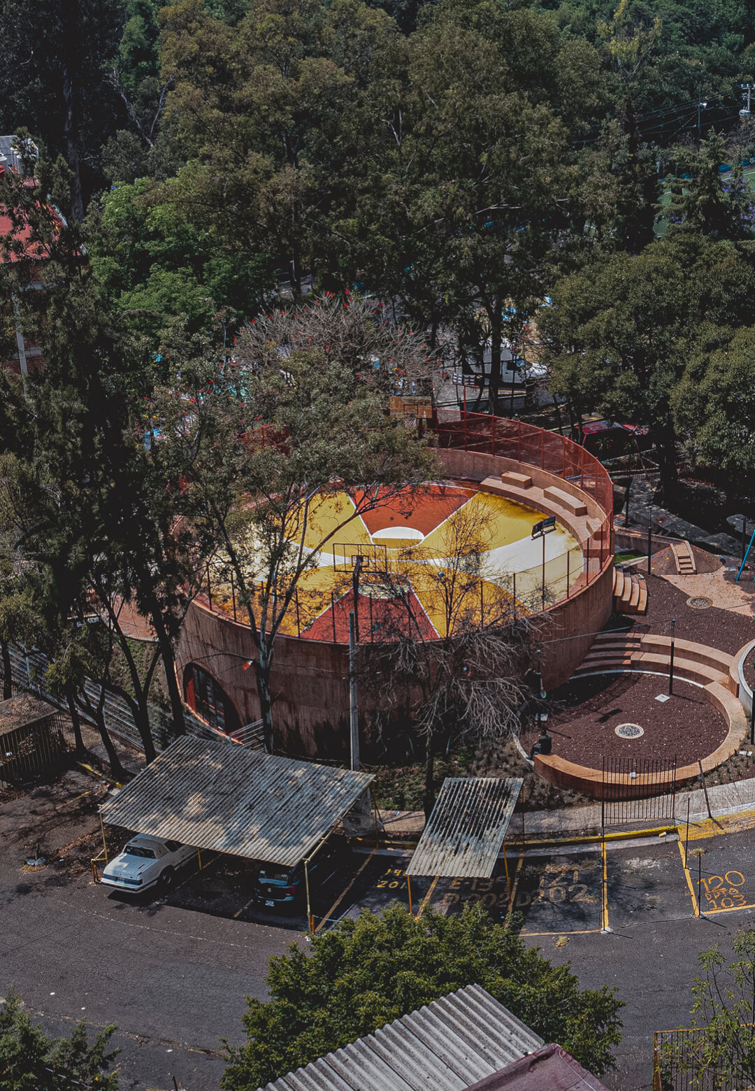 AMASA Estudio reclaims a steep ravine in Mexico as a circular park and community centre for residents of UH INFONAVIT Santa Fe | Infonavit Santa Fe housing complex | AMASA Estudio | STIRworld