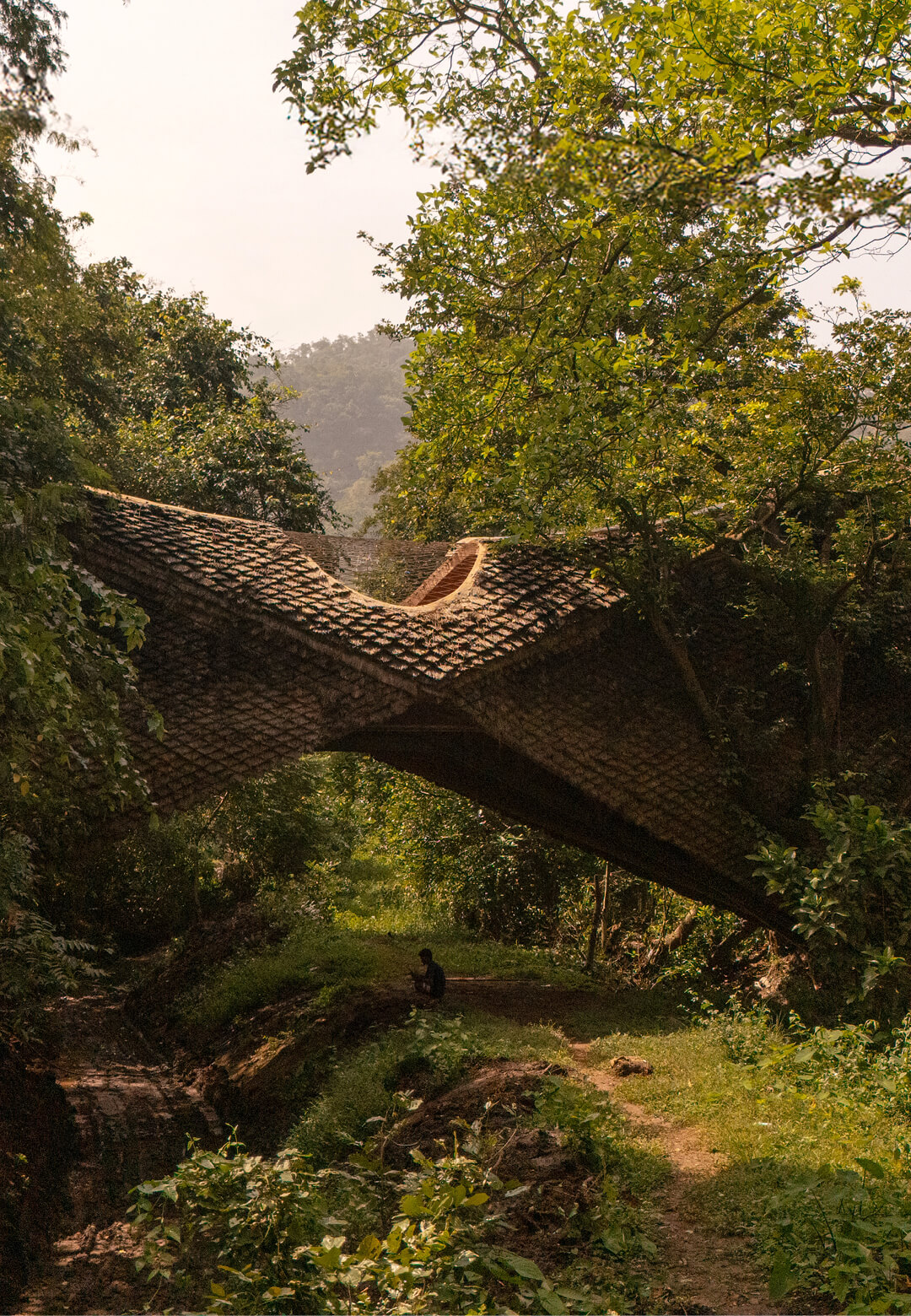 Located in Karjat, Maharashtra, the Bridge House by Wallmakers camouflages itself with the dense natural landscape | Bridge House | Wallmakers | STIRworld