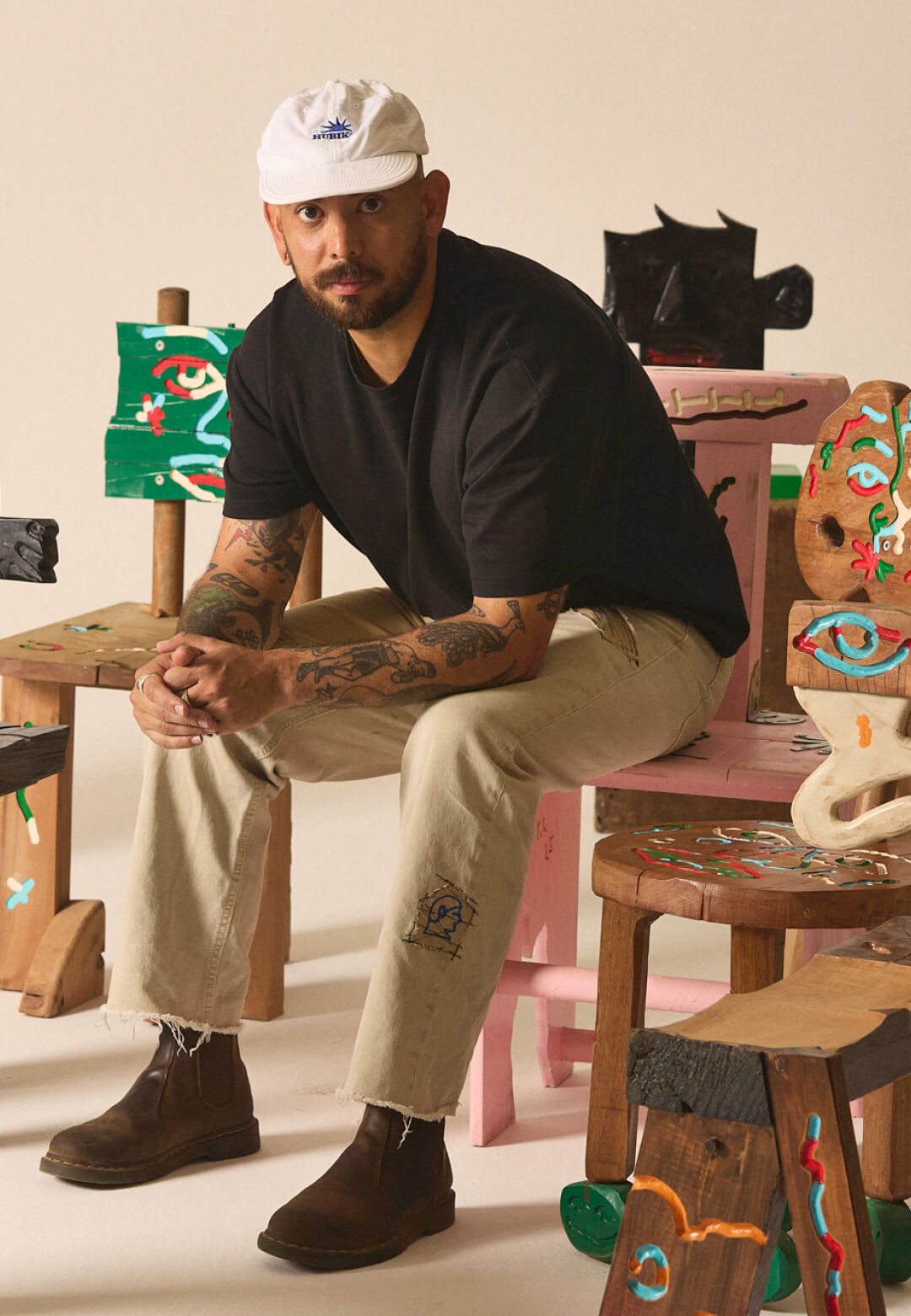 Faces, lines and figures populate the irregular surface of Chilean artist and designer Camilo Huinca&rsquo;s furniture | Camilo Huinca | STIRworld