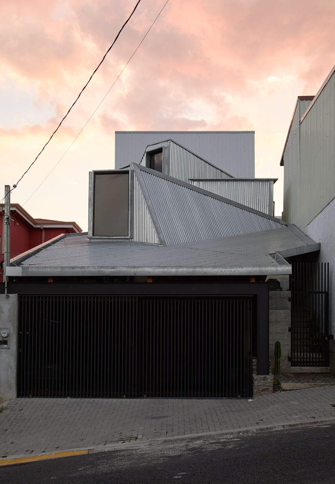Casa en Mercedes in Costa Rica by Ivan Delgado-founded practice id | arkosis features corrugated metal sheets assembled in a strong geometry | Home in Marcedes | id | arkosis | STIRworld