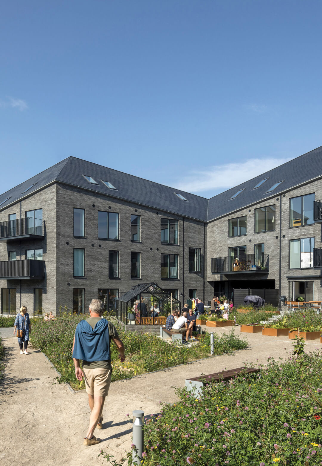 Danish architecture firm CEBRA’s design for a housing complex in Malling incorporates three courtyards to serve as communal gathering spaces | Malling Dampmølle | CEBRA | Denmark | STIRworld