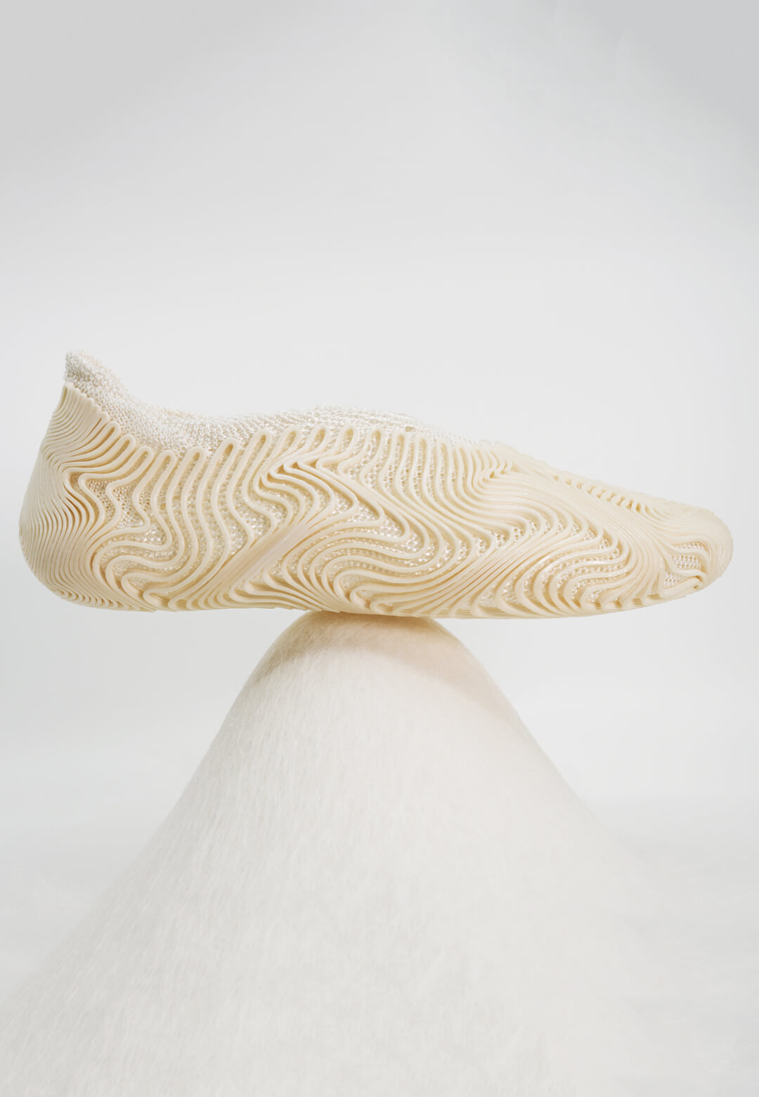 A 100 per cent polyhydroxyalkanoate (PHA) shoe, created using the O° design system | O° | OXMAN | STIRworld
