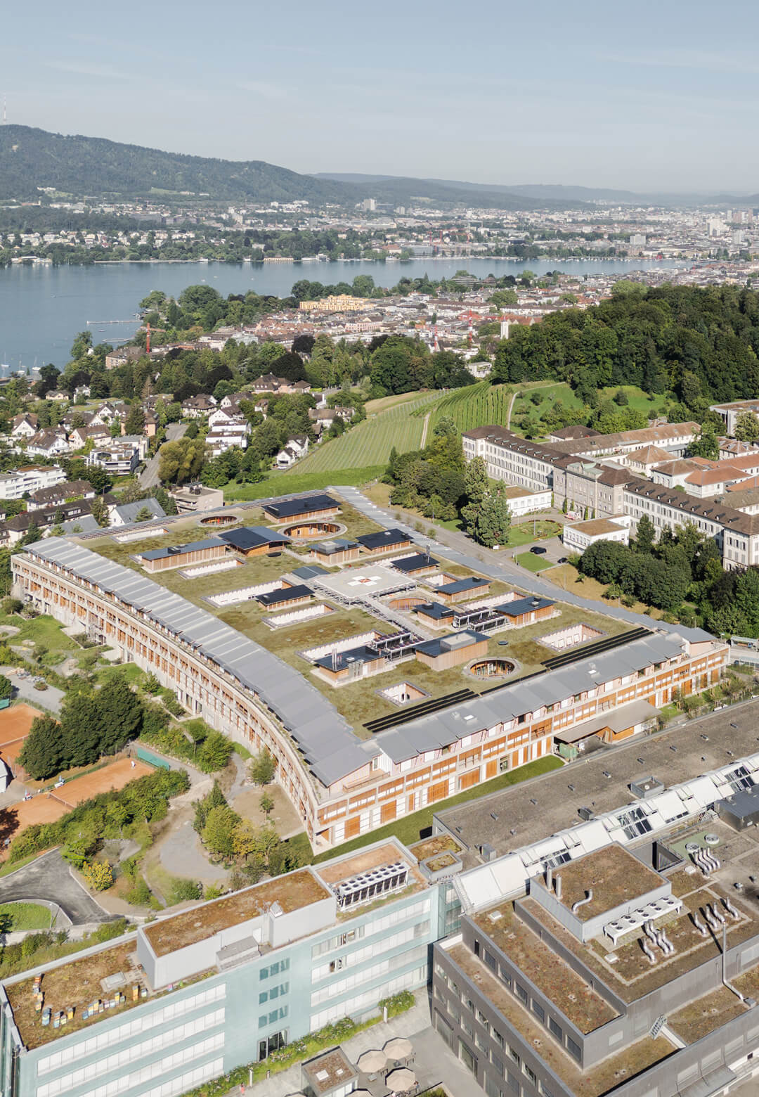 The low-lying structure for the Kinderspital Zurich, designed to “function like a town” spans 200m | 377 Kinderspital Zurich | Herzog and de Meuron | STIRworld