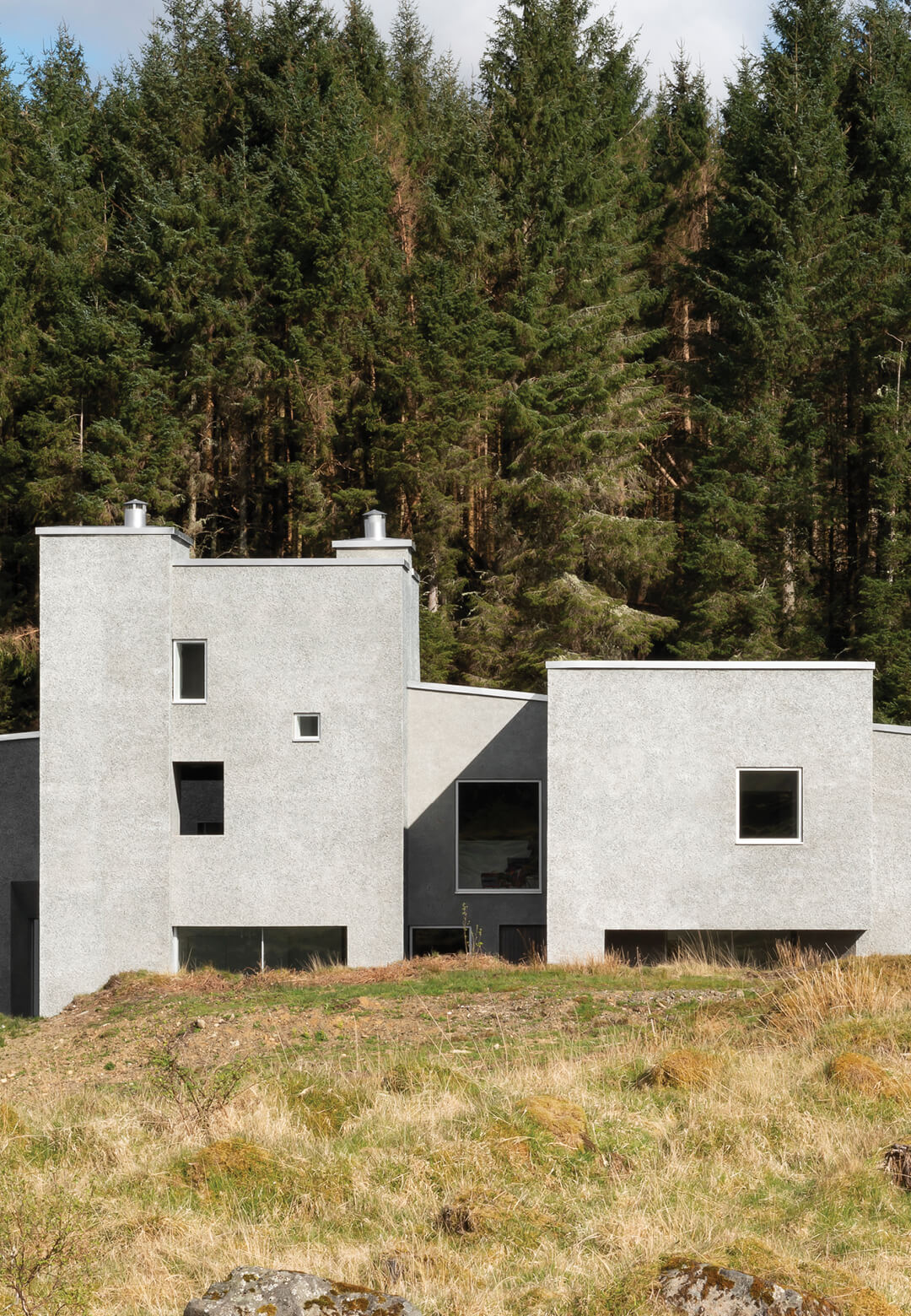 ‘Hundred Acre Wood’ is a family residence carved in concrete near Loch Awe, Argyll and Bute | Hundred Acre Wood | Denizen Works | STIRworld