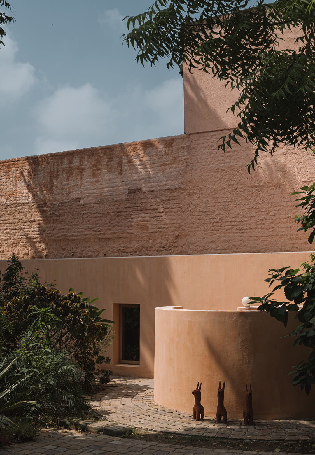 Indian architecture practice IKSOI transforms an abandoned factory into their own workplace, its monolithic forms dressed in muted pink | Mana | IKSOI Studio | STIRworld