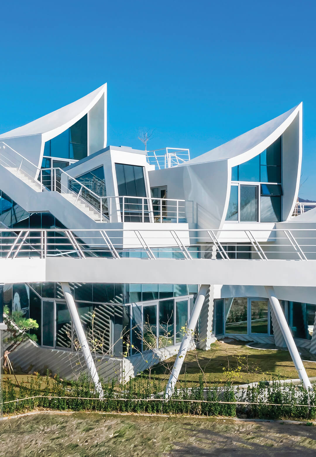 Evocative of a sailboat, the arresting home showcases a number of unique architectural elements that connect it to the sea | Sailing House | IROJE KHM Architects | STIRworld
