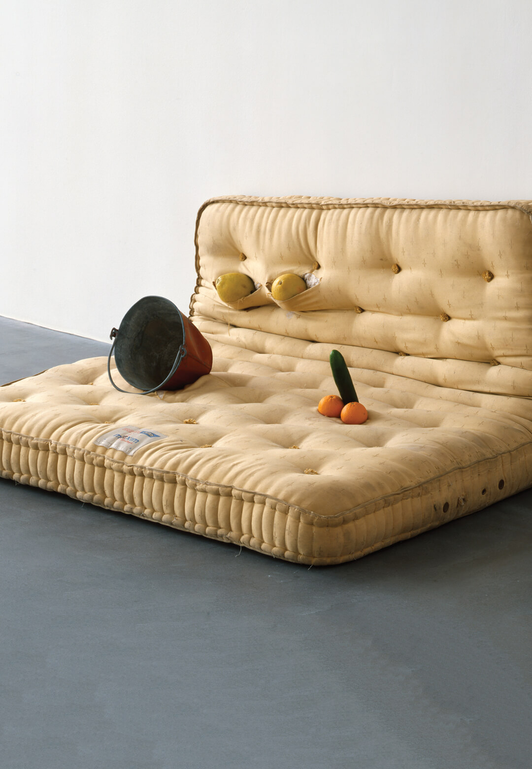 ‘Au Naturel’, mattress, melons, oranges, cucumber, water bucket, 1994, Sarah Lucas | Sarah Lucas - Sense of Human | STIRworld
