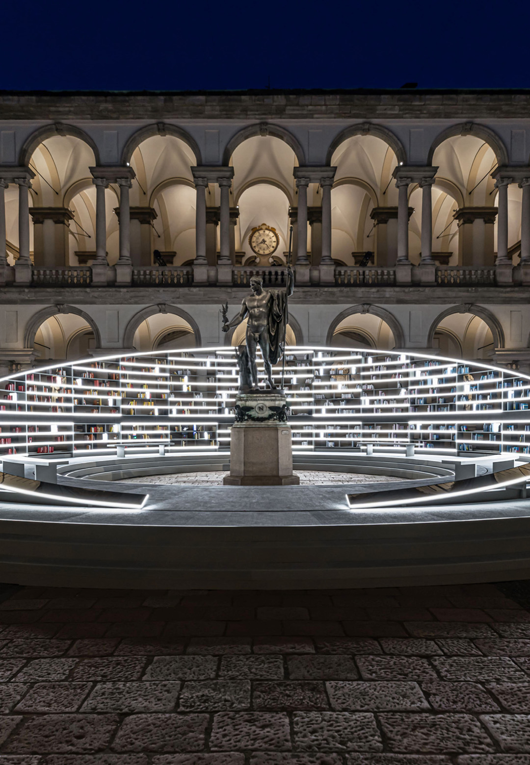 Designed by Es Devlin, the kinetic installation ‘Library of Light’ adorns the 17th-century Cortile d'Onore building for the Salone del Mobile.Milano 2025 | Library of Light | Es Devlin | STIRworld