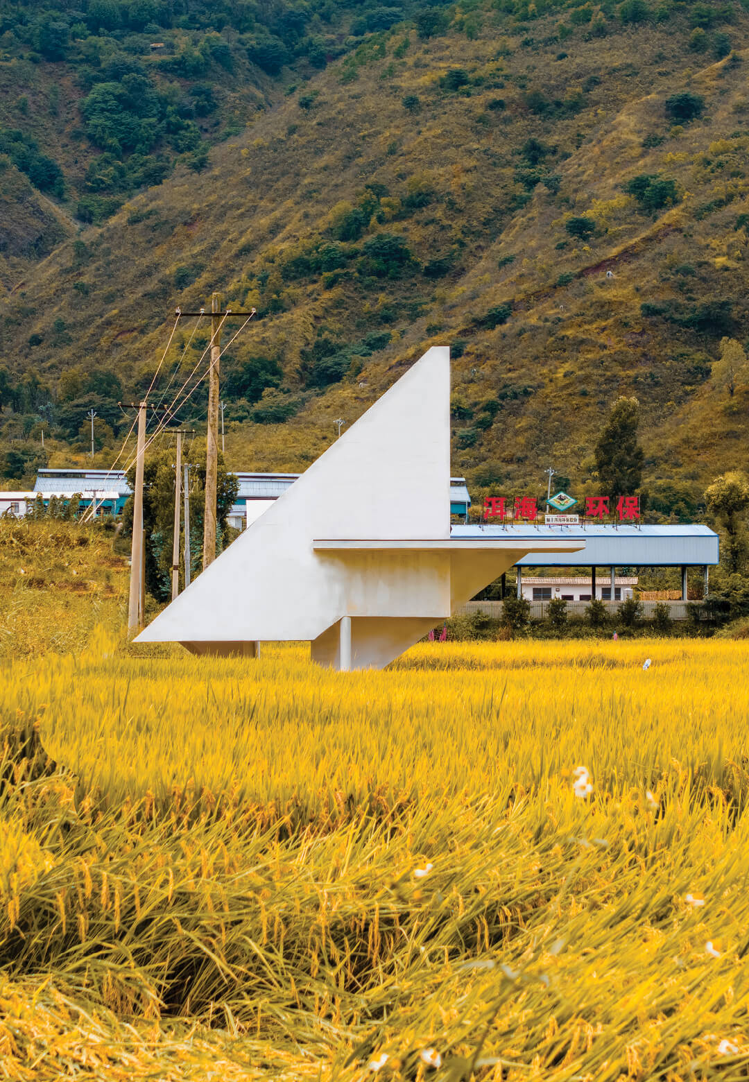 A pavilion, designed by LIN Architecture, stands stark against the rural Chinese landscape, acting as a static guide for the villagers and tourists alike | Concrete Pavilion | LIN Architecture | China