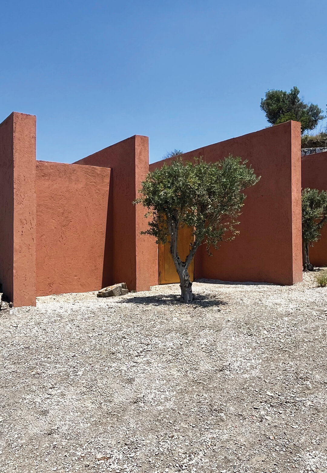 The subterranean structure for Rubrum Office appears as simple vertical elements in the landscape of Izmir’s vineyards | Rubrum Office | Office Istanbul Architects | STIRworld
