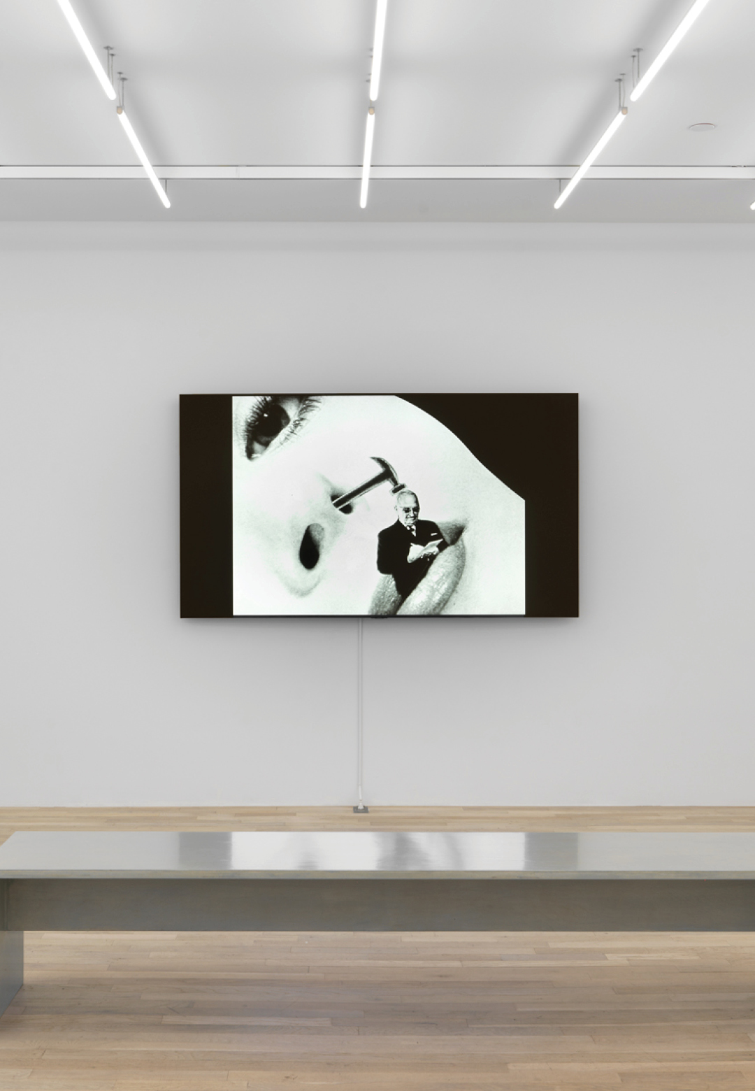 Installation view of Skullduggery, 1960, 35mm film and Digital transfer, black and white, sound, edition of 6 plus 2 artist's proofs, Stan VanDerBeek | Stan VanDerBeek: Transmission | Magenta Plains |