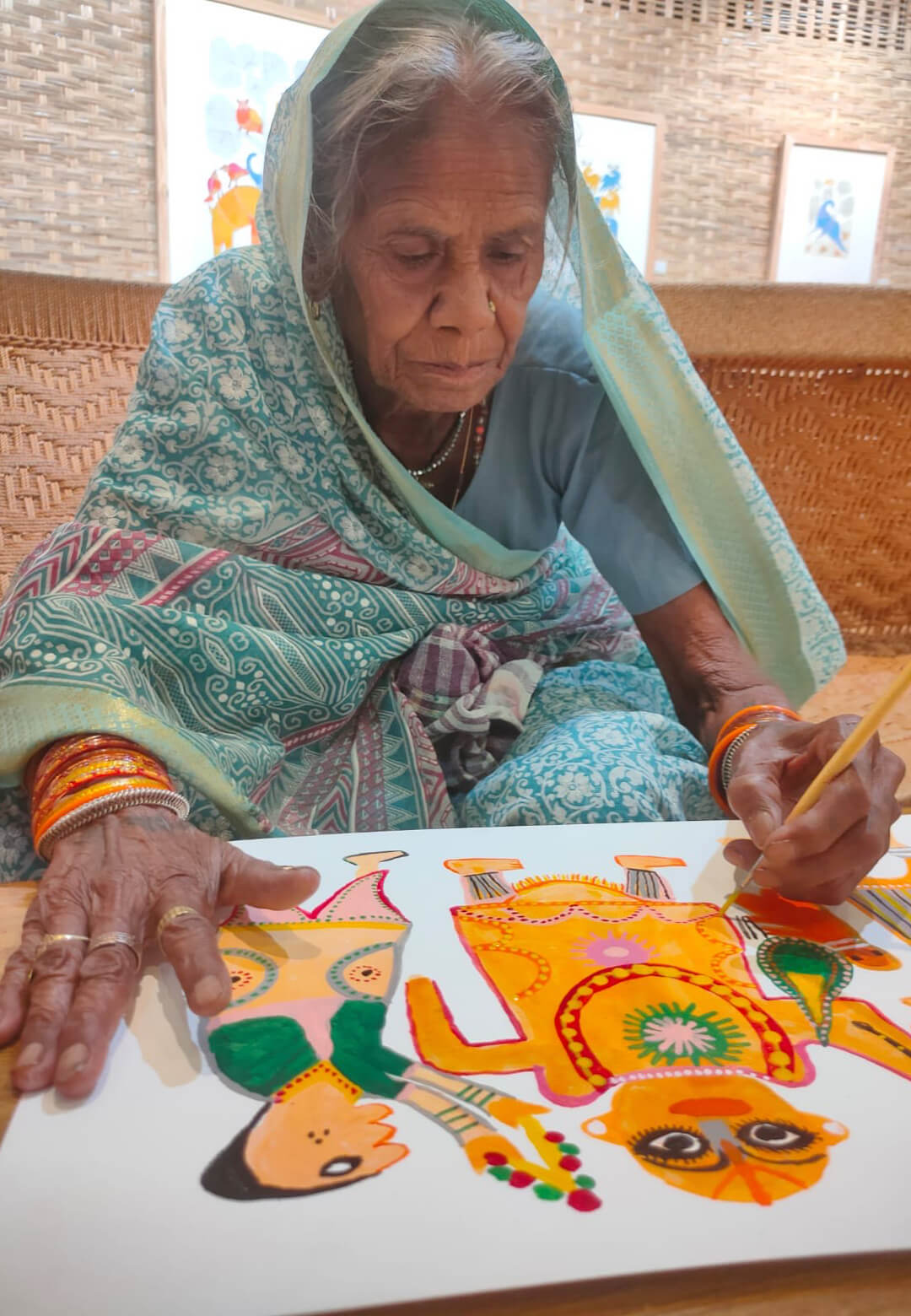 (L-R) Exhibition view of &lsquo;Bloom at Dusk&rsquo; at Ojas Art, New Delhi; Portrait of Jodhaiya Bai Baiga | Bloom at Dusk | Minhazz Majumdar | STIRworld
