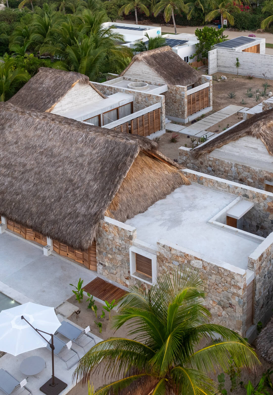 The house is surrounded by beach houses on either side | Tate House | MATERIA + Gustavo Carmona | STIRworld