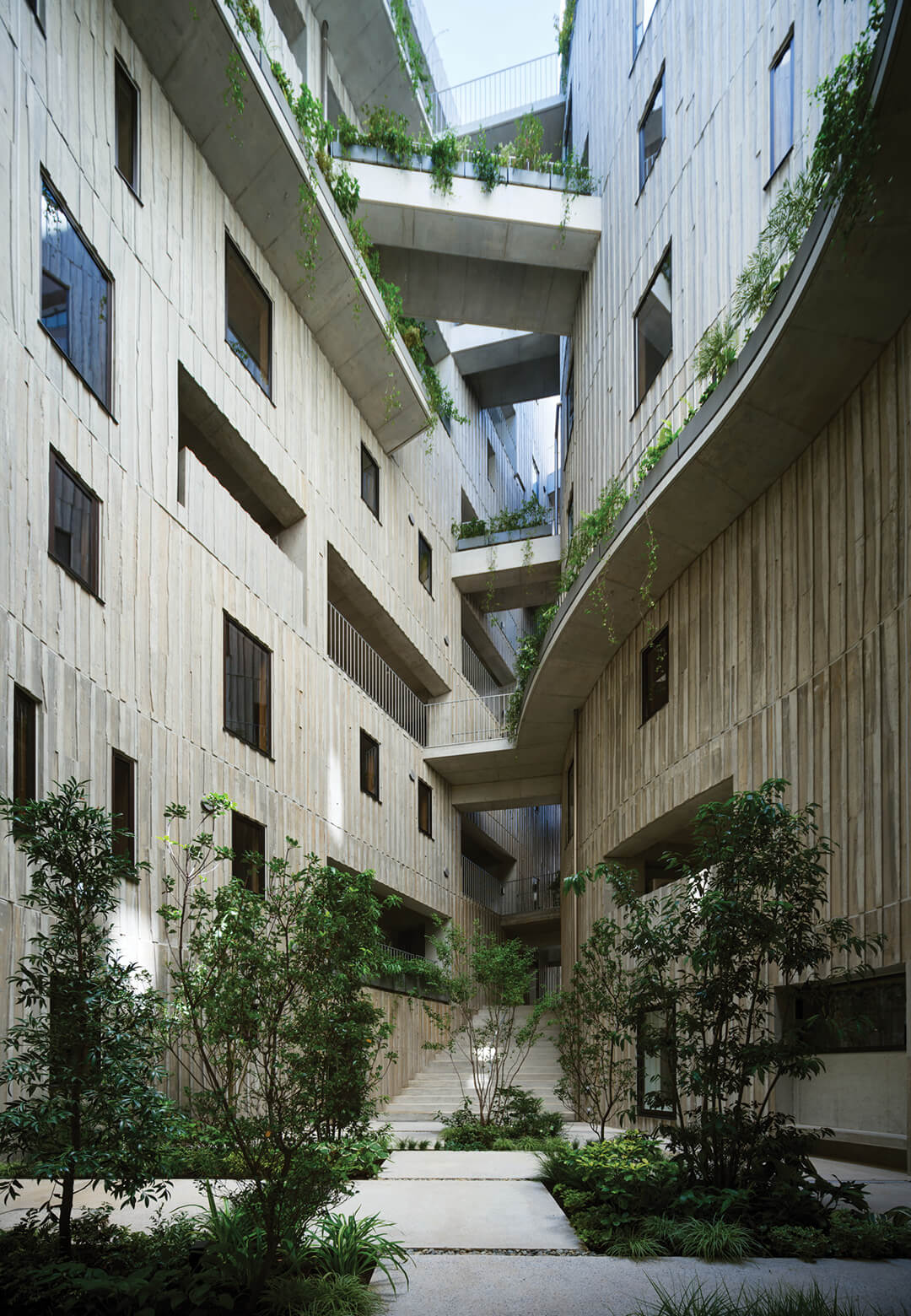 The Tenjincho Place apartment complex is designed around a courtyard to maximise natural light and ventilation in residential units | Tenjincho Place Complex | Hiroyuki Ito Architects | Japan | STIRwo