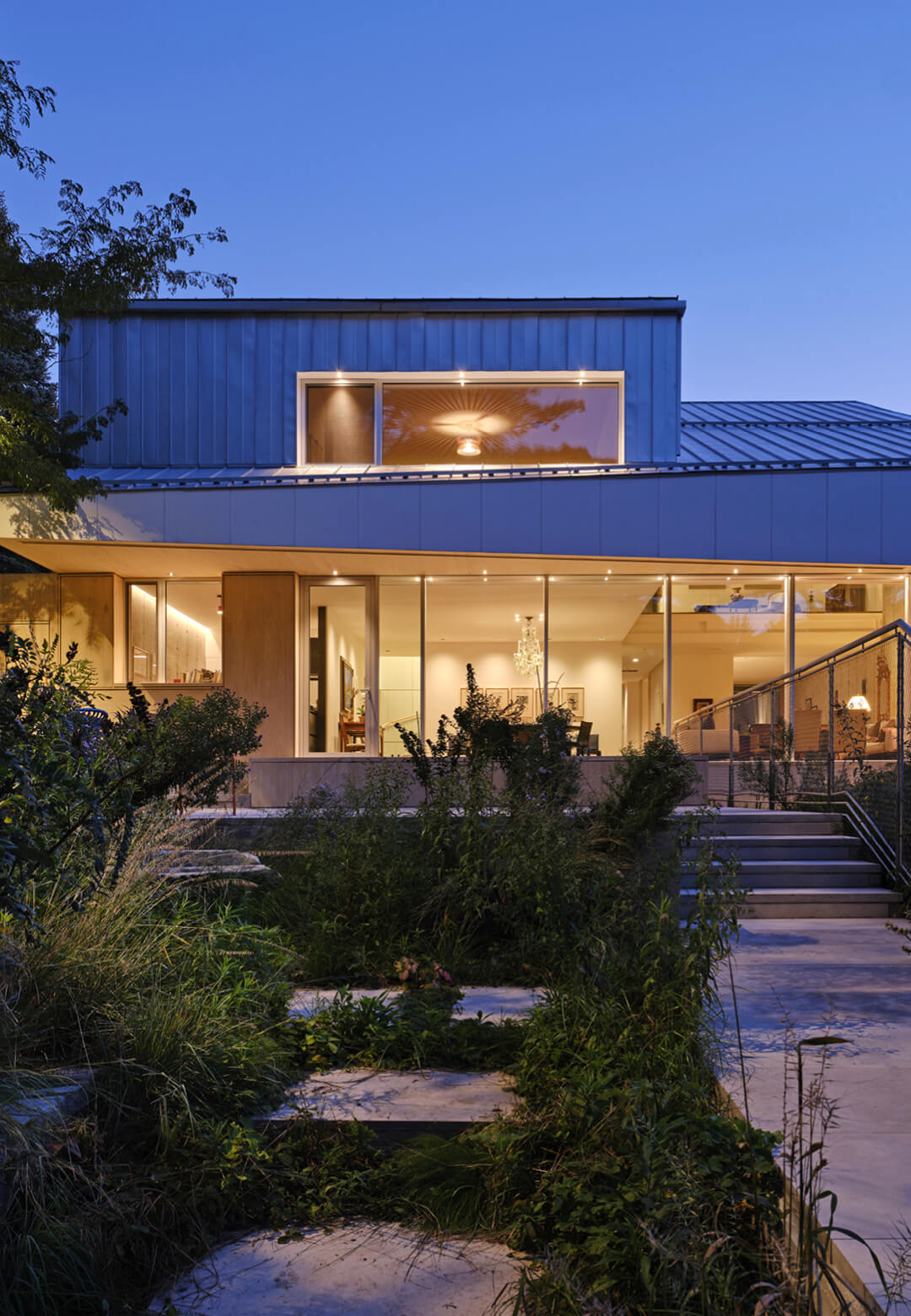 The outdoor landscape features terraced gardens that facilitate a deeper connection with the natural environment | West Don Ravine Passive House | Poiesis Architecture | STIRworld