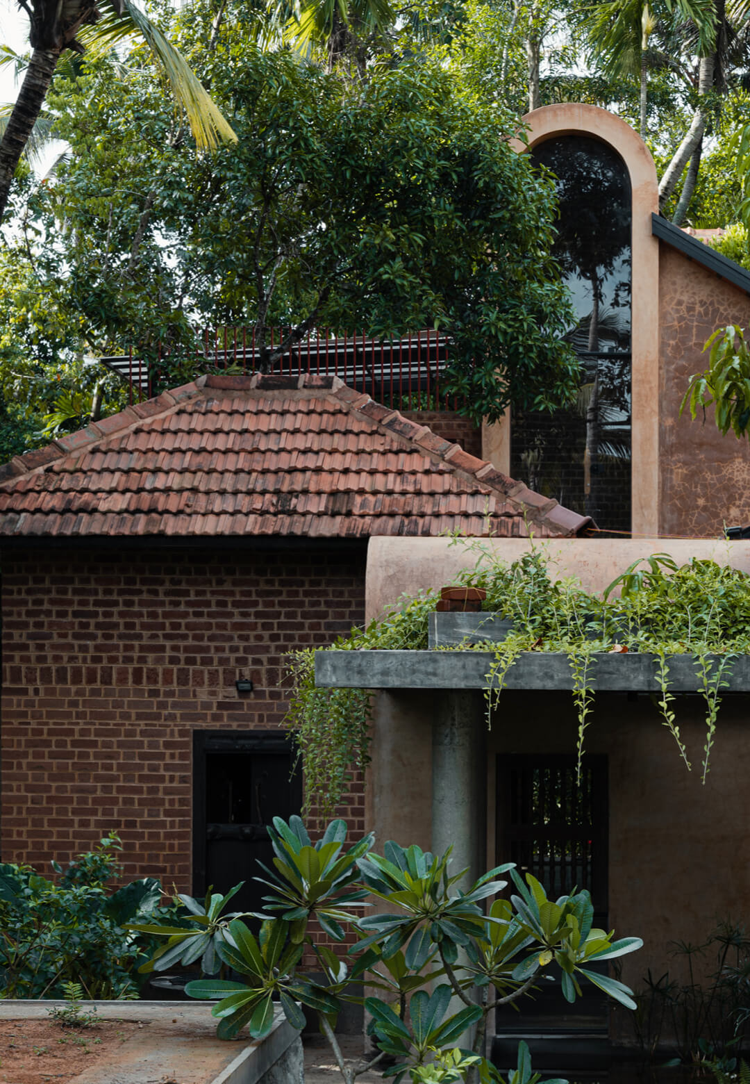 Drawing on the spirit of the land and kaavus (sacred groves), Of Trees and Gods and Mud house is a meditation on material honesty and memory | Of Trees and Gods and Mud | Urava | STIRworld