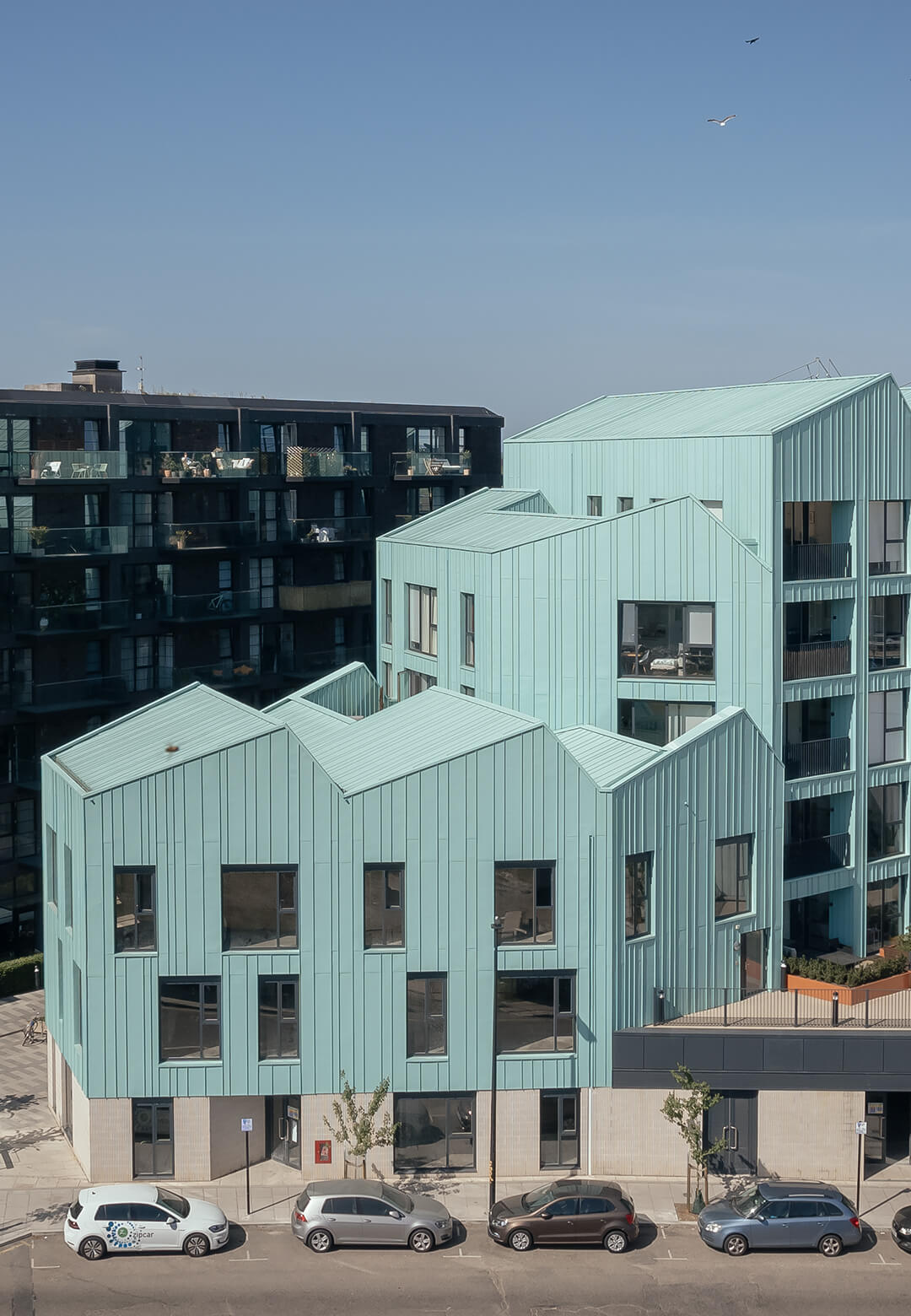 Wick Lane’s post-industrial cluster blends concrete commercial bases with corrugated steel and brick residential volumes | Wick Lane | dRMM Architects | STIRworld
