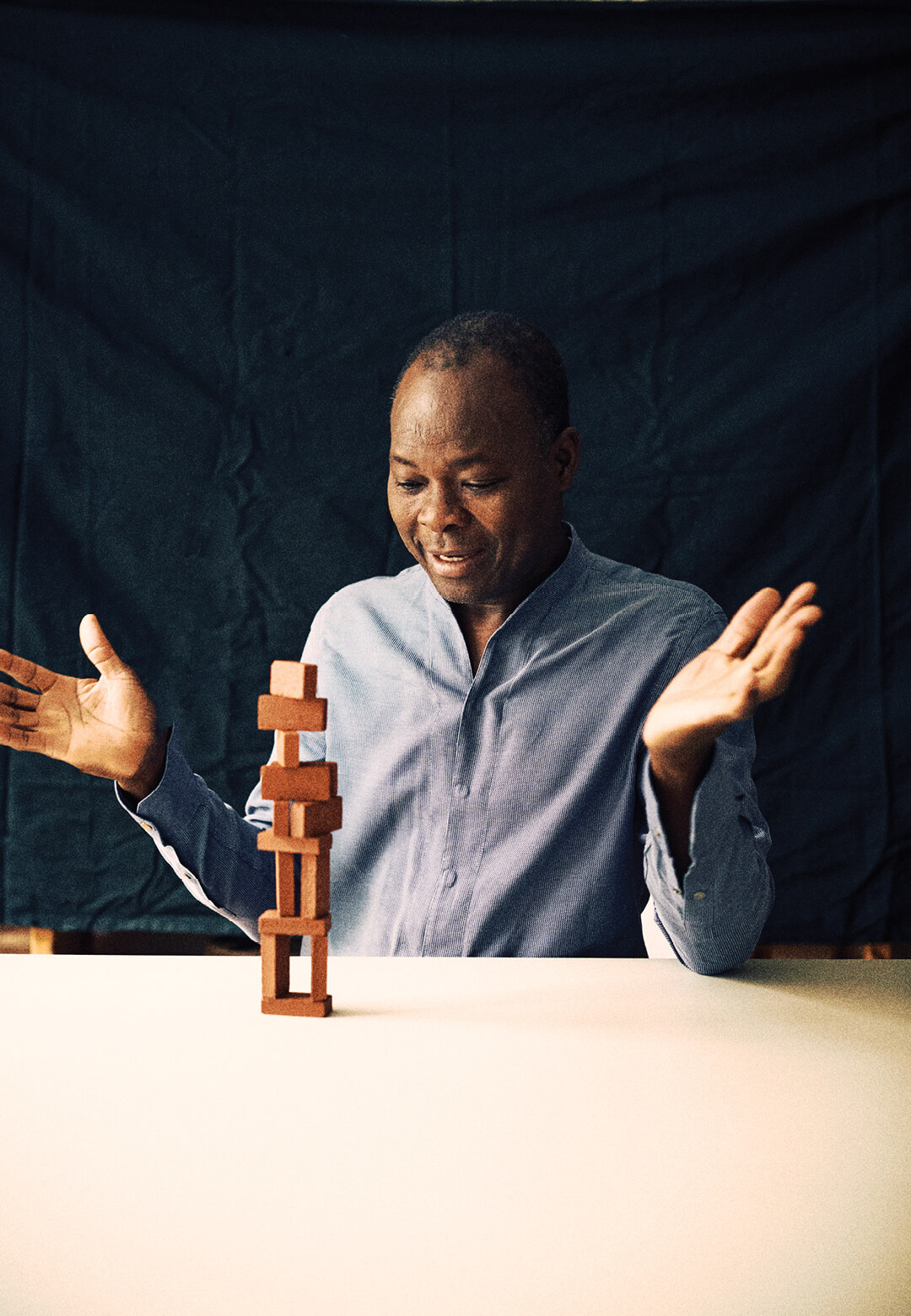 (L) Burkinabè-German architect Diébédo Francis Kéré, (R) Gando Teachers' Housing by Kéré | 2024 Crystal Award | Francis Kéré | STIRworld