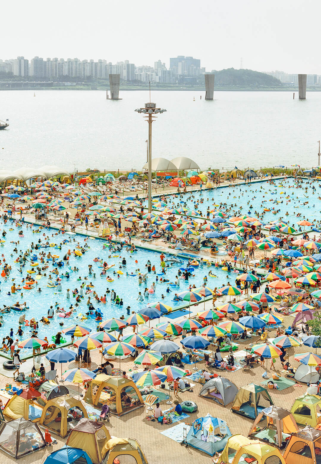 01 Swimming Pool, 2016, from 'Better Days' by Seunggu Kim, capturing South Koreans finding joy and connection amidst societal change| Better Days | Seunggu Kim | STIRworld