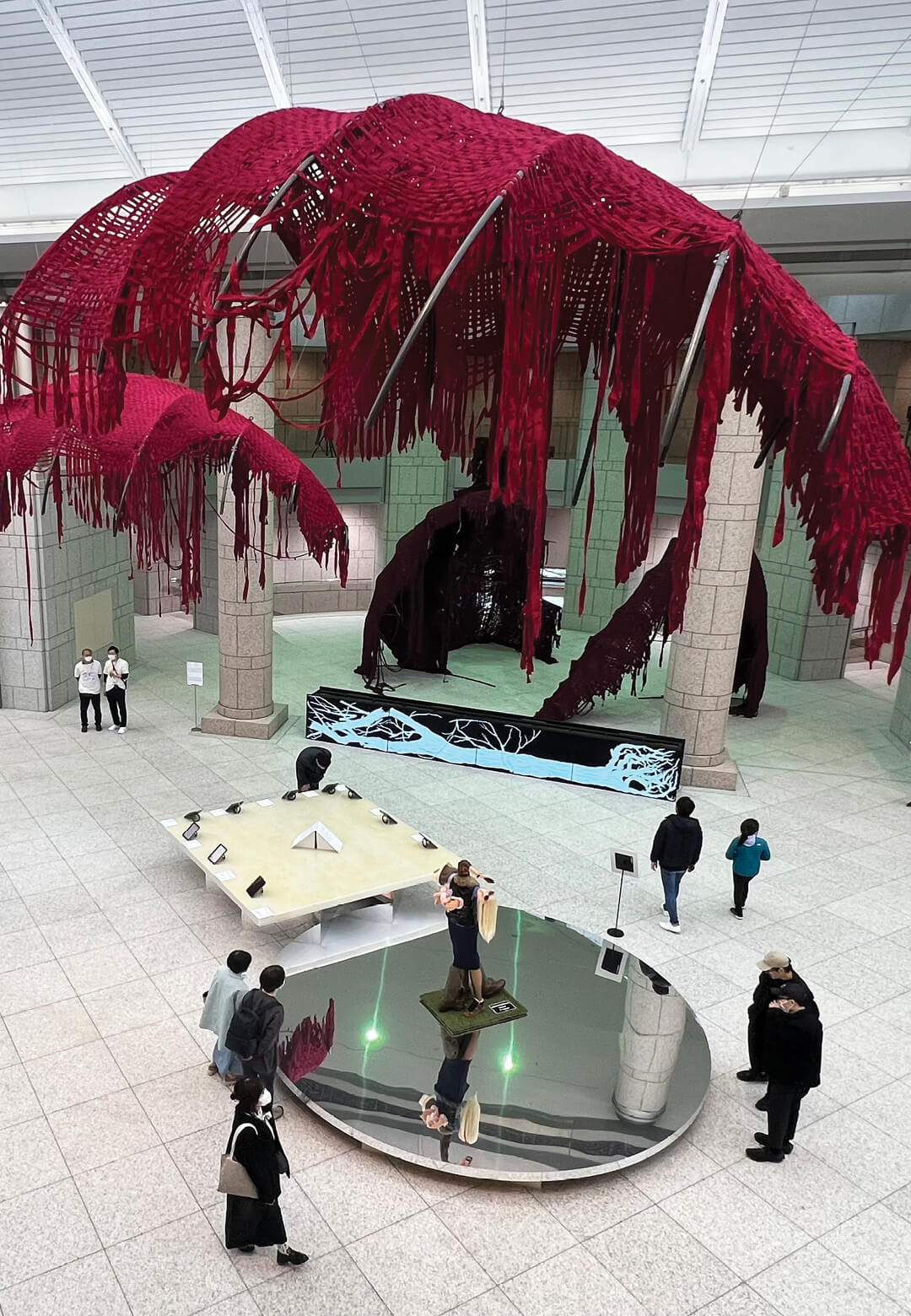 Installation view of artist Sandra Mujinga’s textile art at the Grand Gallery, Yokohama Triennale 2024 | Yokohama Triennale 2024 | STIRworld