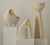 The 'Nomad II' collection is defined by playful, zoomorphic light sculptures in clay