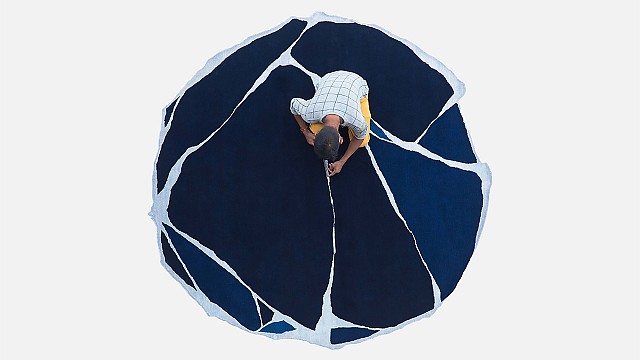 Atelier Février animates village landscapes and art techniques in their rug designs