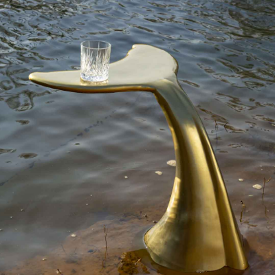 Nama Home x Reef Watch create table that mimics a whale&rsquo;s fin