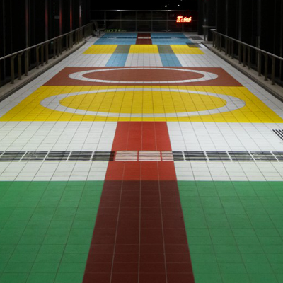 Colourful tiles inspired by 20th-century train tickets envelop Hoppers Crossing walkway