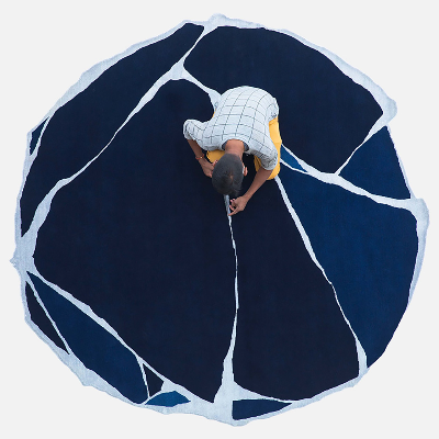 Atelier Février animates village landscapes and art techniques in their rug designs