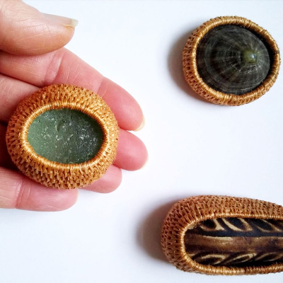 Jane Haselden&rsquo;s plant fibre baskets cocoon shells, stones and earthenware
