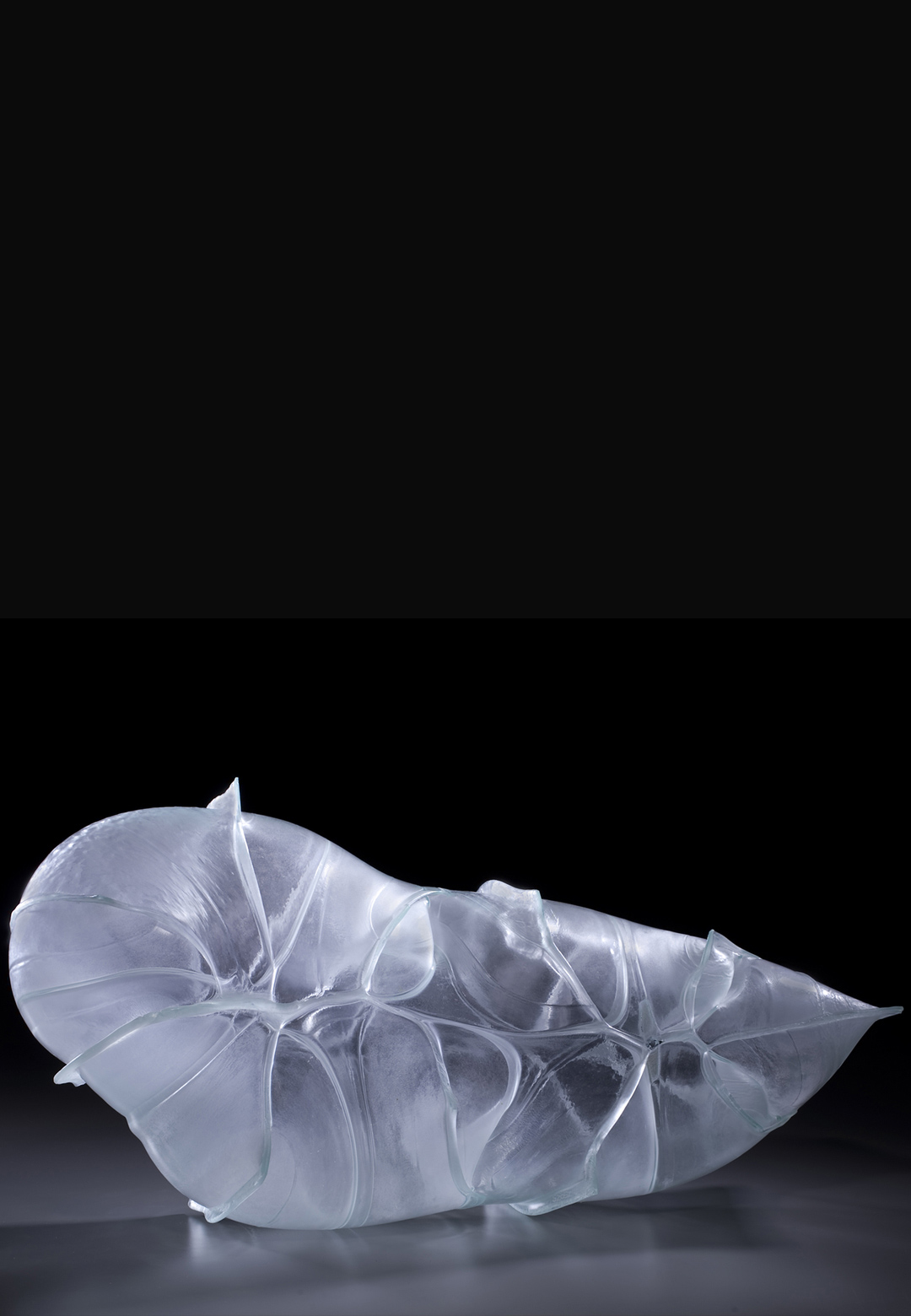 Matthew Sz&ouml;sz inflates glass with air to build ballooned sculptures