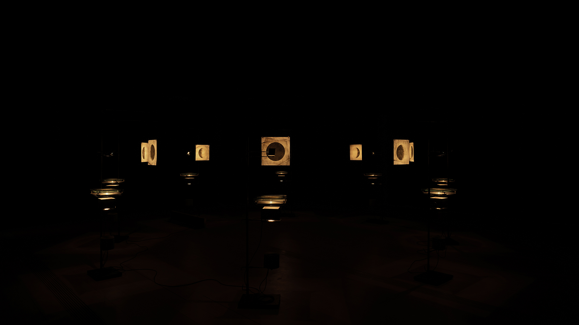 JAMESPLUMB evokes 'Stained Moons' by harnessing the patina of time on glass